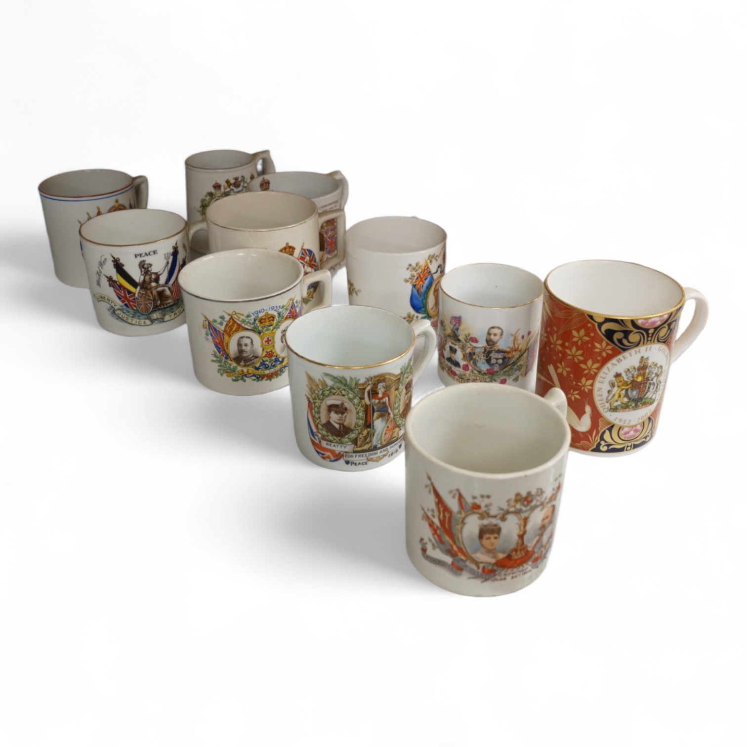 A lithophane commemorative mug and ten others to include George VI and Elizabeth coronation 1937, largest 9.5cm high